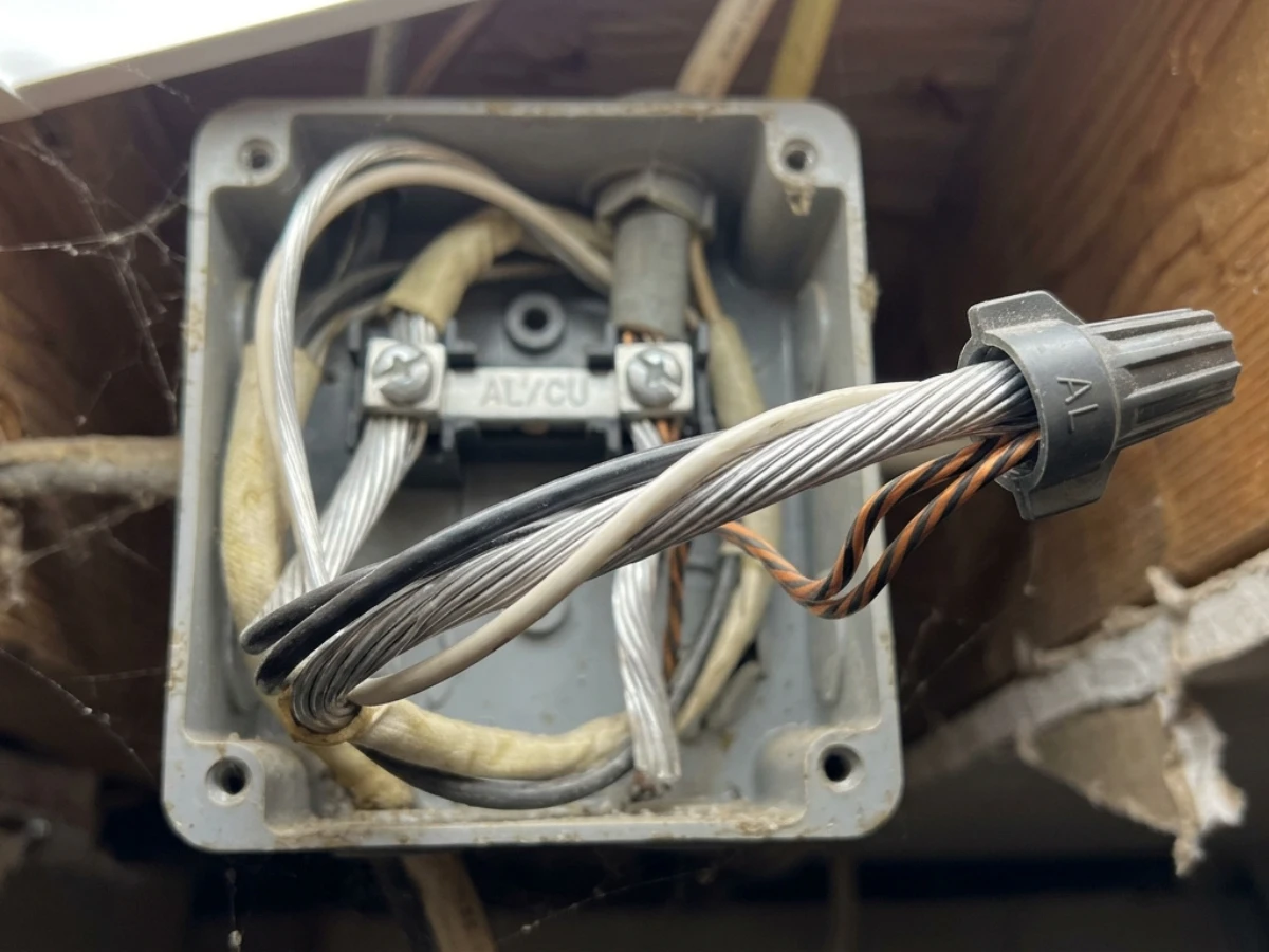 Image of aluminum wiring in an electric outlet