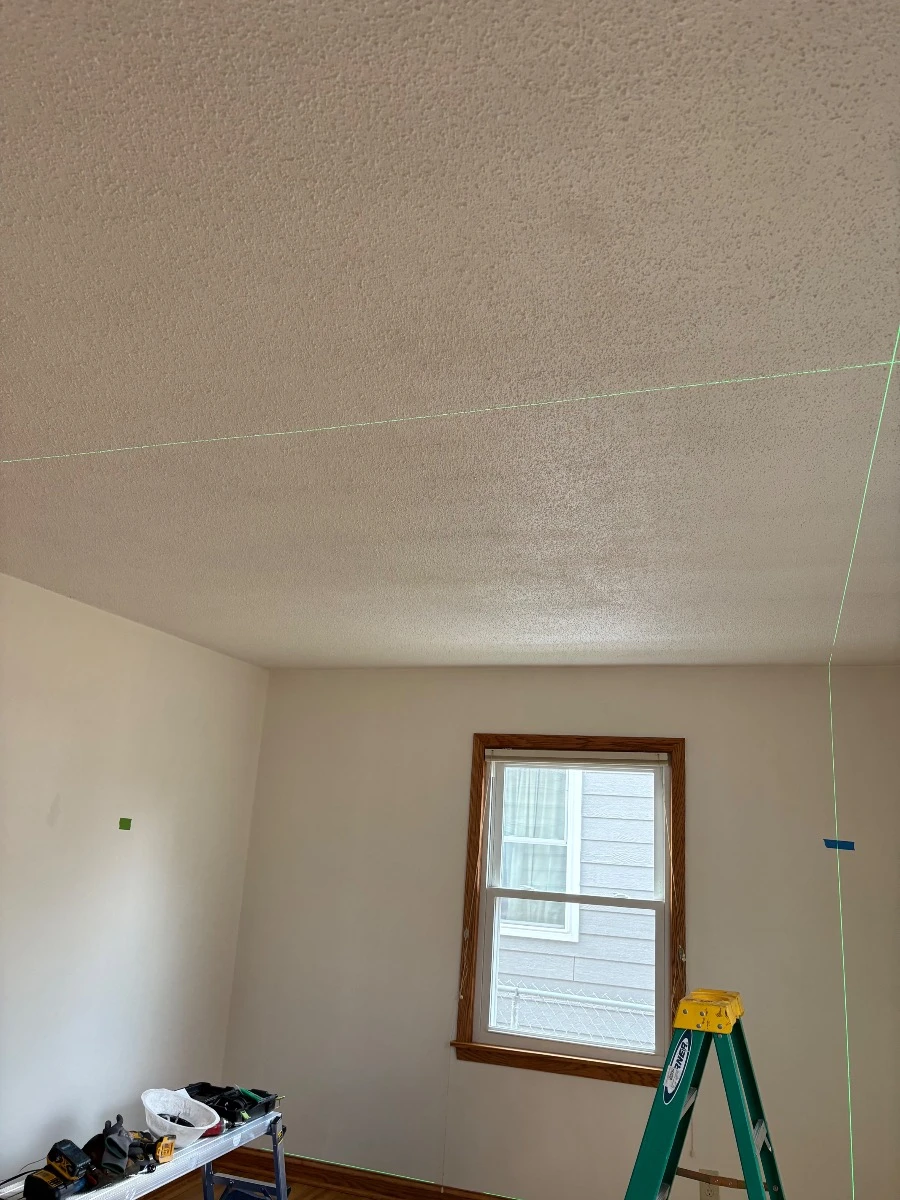 Living room prepared for new wafer light installation in a St. Louis Park, MN home.